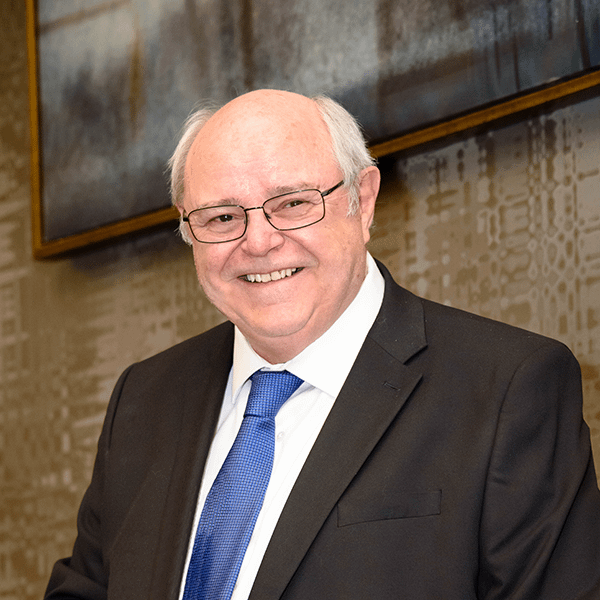 Harold Cring Harold Cring, Member of Bette & Cring, smiling in a black suit with a blue tie.